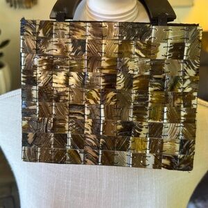 Adorable woven tortoise shell bag